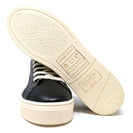 Sylven Mel Black/Oat vegan apple leather sneakers - with one shoe showing bottom soles thumbnail